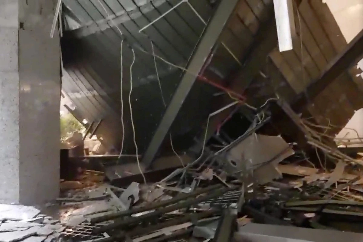 Debris is scattered inside the Indonesia Stock Exchange, in this video grab taken from social media. (Reuters)