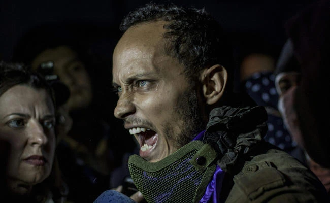 This file photo taken on July 13, 2017 shows Venezuelan police officer Oscar Perez participating in an anti-government protest in Caracas on July 13, 2017. (AFP / INAKI ZUGASTI)