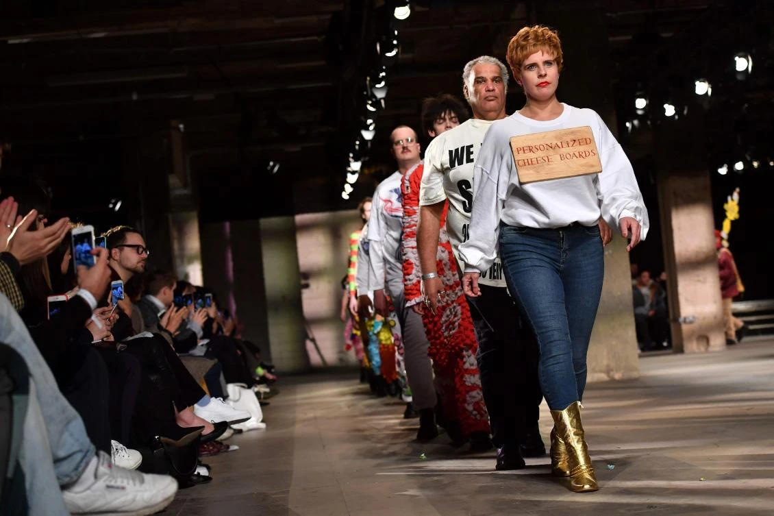Designer of Rottingdean Bazaar, (R), as part of the MAN collection, joins models during a catwalk show on the third day of the Autumn/Winter 2018 London Fashion Week Men’s, in London on January 7, 2018. (AFP)