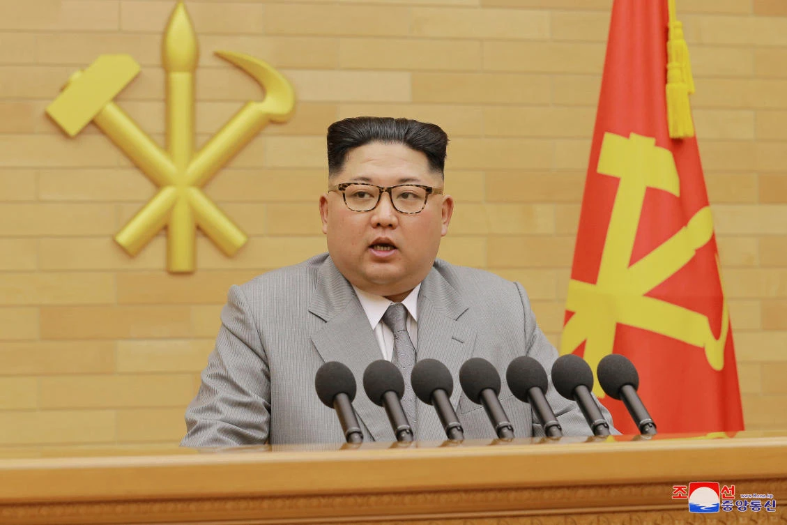 Kim Jong Un speaks during a New Year’s Day speech in this photo released by Pyongyang’s Korean Central News Agency, where he warned that “the nuclear button is always on my table.” (AFP)
