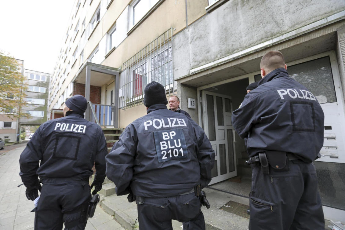 Above, file photo of German police. Federal Prosecutors Office said the raids took place early Tuesday at private homes and offices across Germany. (AP)
