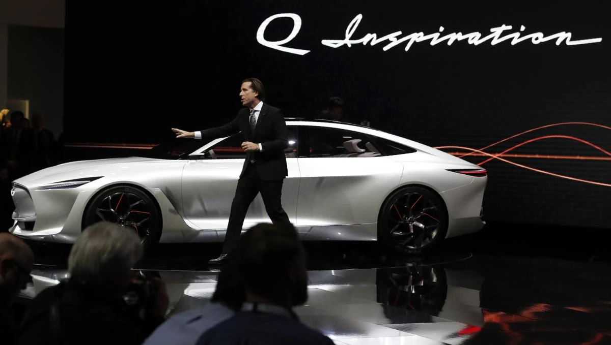 Aflonso Albaisas, Senior Vice President for Global Design at Nissan, introduces the Infiniti Q Inspiration concept car at the North American International Auto Show in Detroit on January 15. (Reuters)