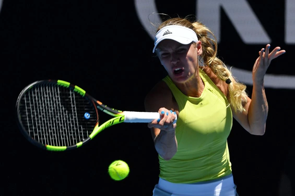 Denmark’s Caroline Wozniacki hits a return against Croatia’s Jana Fett during their women’s singles second round match of the Australian Open tennis tournament in Melbourne on January 17. (AFP)