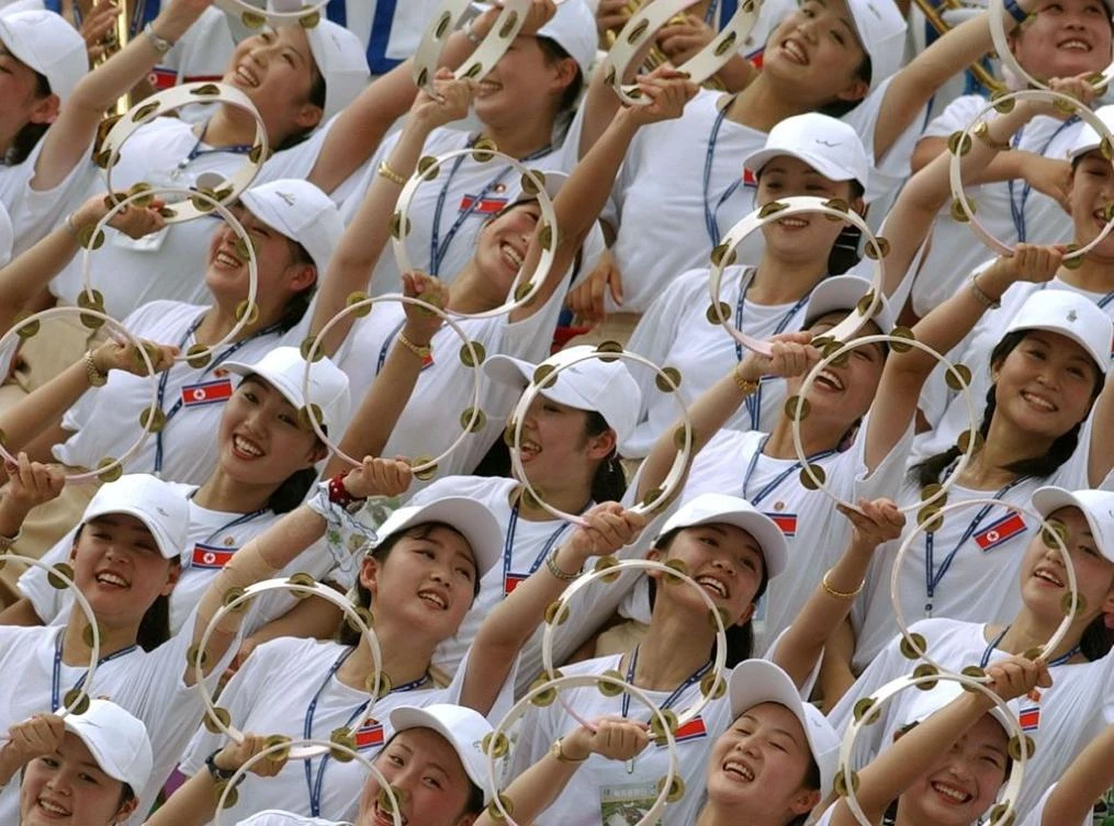 North Korea’s cheerleading squad — dubbed the Hermit Kingdom’s “army of beauties” — are handpicked by Kim Jong Un himself. (AFP)