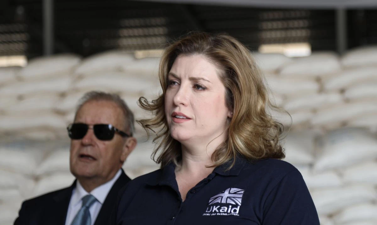 International Development Secretary for the UK Penny Mordaunt sees UK aid for Yemen in a WFP warehouse in Djibouti. (Photo: UK Department for International Development - DIFD/Benet Coulber)