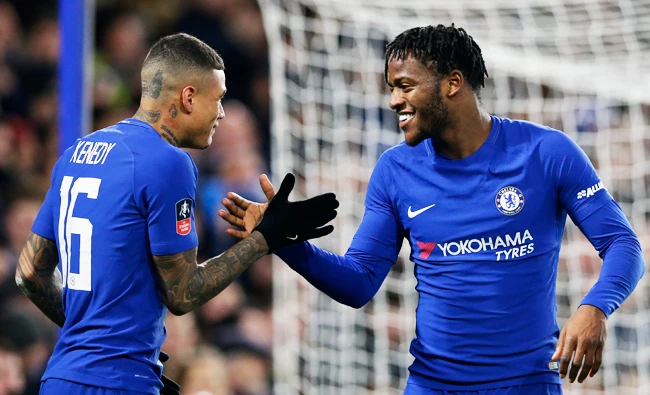 Chelsea's Michy Batshuayi, right, celebrates with Kenedy after scoring his side's opening goal. (AP)