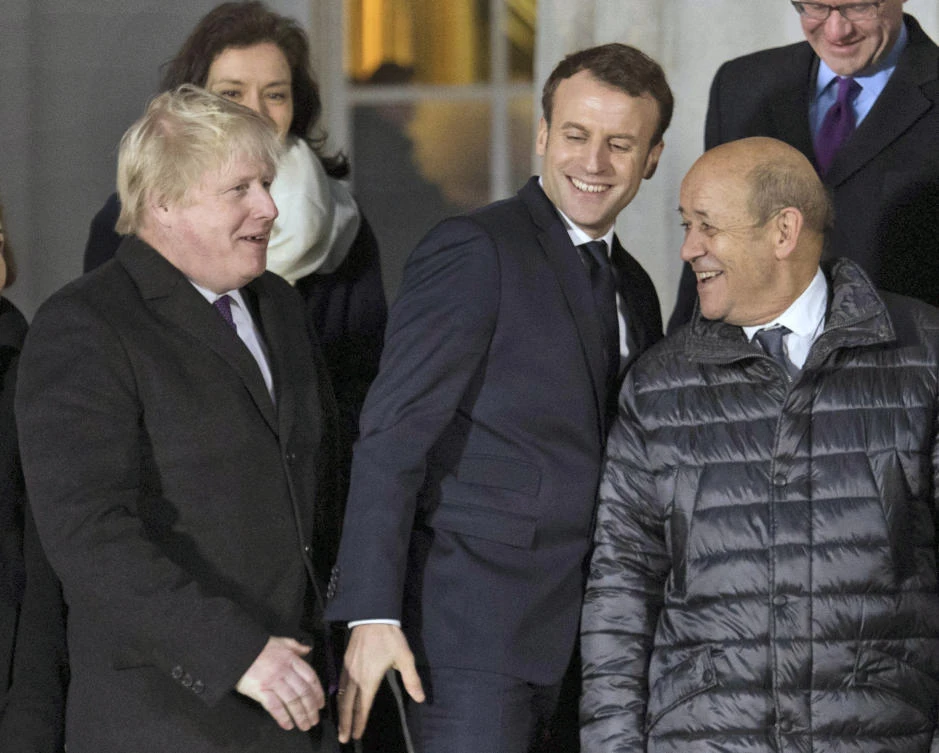 British Foreign Secretary Boris Johnson with French President Emmanuel Macron. Johnson proposed building a bridge to France. (AP)