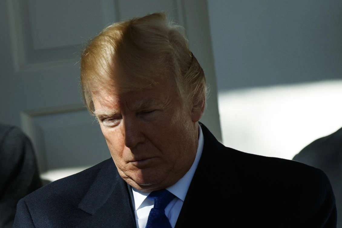 President Donald Trump pictured on Friday plans to meet with British Prime Minister Theresa May at Davos next week. (AP)