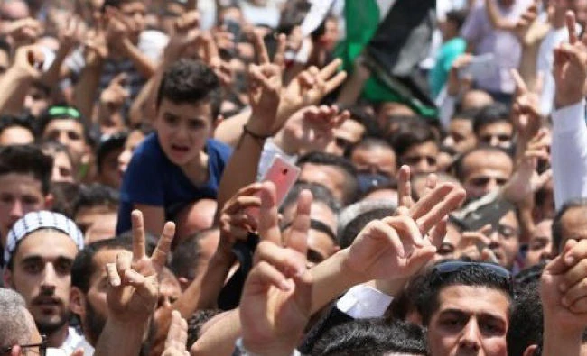 Mourners attend the funeral of Mohammed Jawawdeh, who was killed by an Israeli security guard at the Israeli Embassy compound in Amman. (AFP/file)