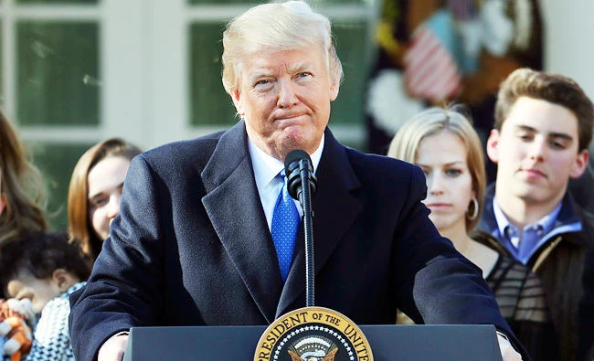 President Donald Trump pauses during his address to the March of Life participants from the Rose Garden of the White House in Washington, on Friday. (AP)