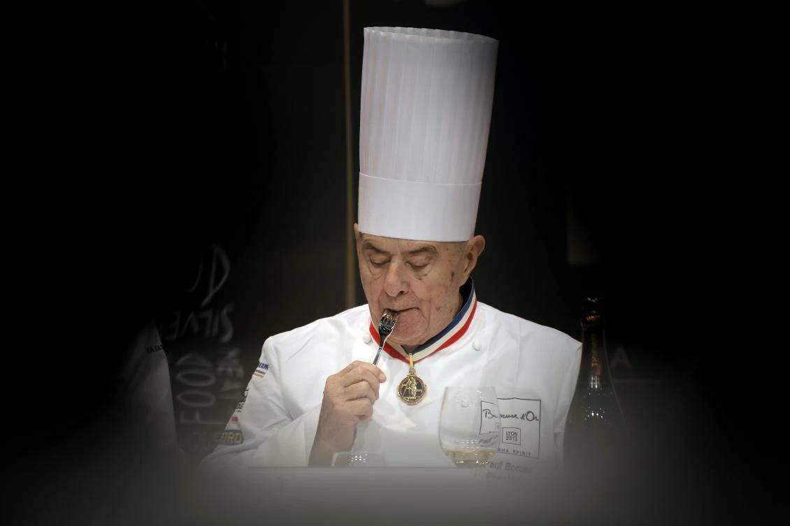 In this file photo, French chef Paul Bocuse tastes a dish during the “Bocuse d’Or” (Golden Bocuse) trophy, at the 14th World Cuisine contest, in Lyon, central France on Jan. 29 2013. (AP)