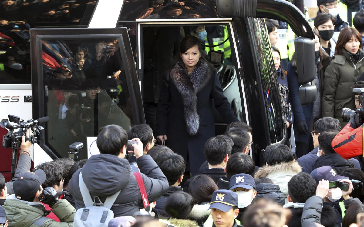 North Korean Hyon Song Wol, head of a North Korean art troupe, gets off a bus as she arrives at the Seoul Train Station in Seoul, South Korea, Sunday, Jan. 21, 2018. (AP)