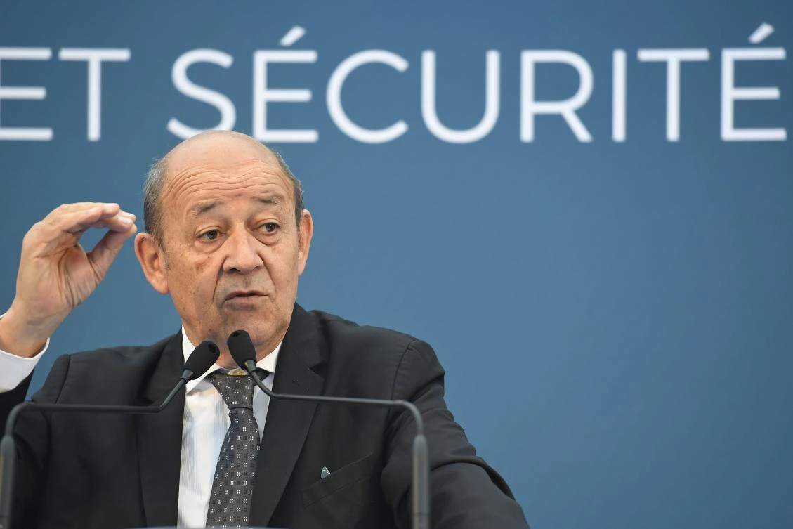 French Foreign Minister, Jean-Yves le Drian, delivers a speech during the inauguration of the RTE (Reseau de transport d’electricite) electrical safety net linking Lorient to Saint-Brieuc consisting of 76 km of cable at 225,000 volts, on January 15, 2018 in Mur-de-Bretagne, western France. (AFP)