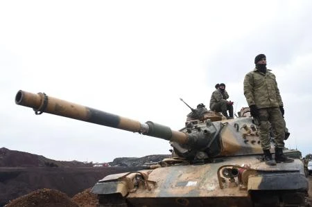 Turkish air raids killed eight civilians on Sunday in the northern Syrian enclave of Afrin, according to a war monitor. (AFP)