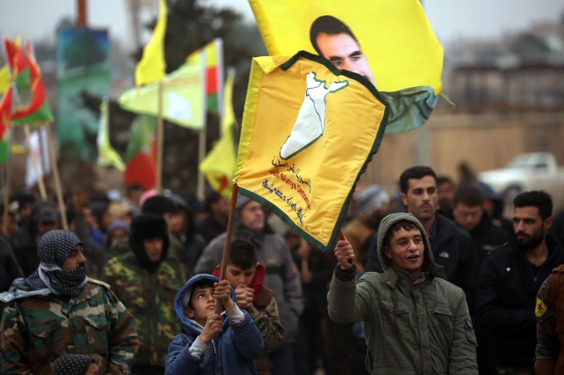 Syrian-Kurds march during a protest in support of Afrin on January 18, 2018. (AFP)