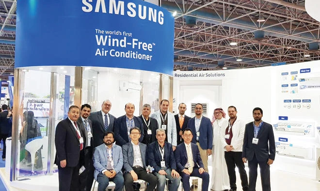 Officials pose during the launching ceremony of Samsung’s world’s first ‘Wind-Free’ air-conditioner.