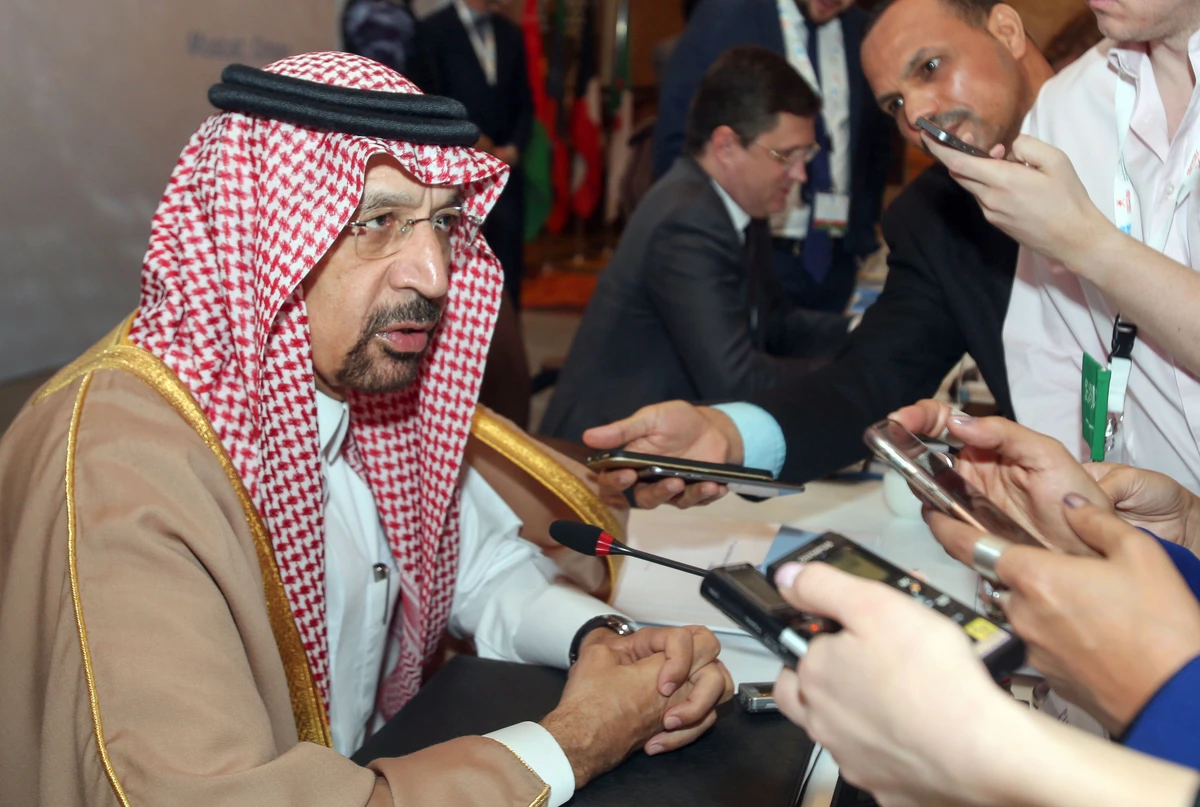 Saudi Energy Minister Khalid Al-Falih talks to journalists during the 7th Meeting of the Joint Ministerial Monitoring Committee in Muscat on Sunday. He called for extending cooperation between OPEC and non-OPEC oil producers beyond 2018. (AFP)