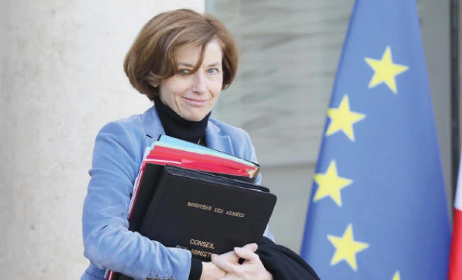 France urges end to offensive against Kurdish militia