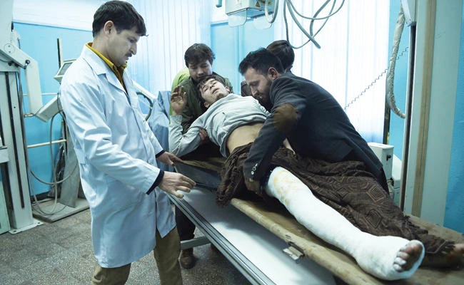 Hasibullah, 20, a wounded employee of the Intercontinental Hotel, gets an X-ray scan at the Wazir Akbar Khan hospital in Kabul on Monday following an attack on the hotel. (AFP)