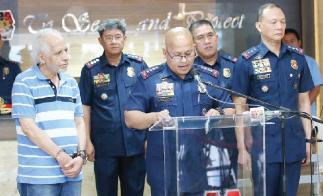 Philippine National Police (PNP) Director General Ronaldo Dela Rosa presents to media the arrested Iraqi national, Taha Mohamed Al-Jabouri. (Photo courtesy: PNP)