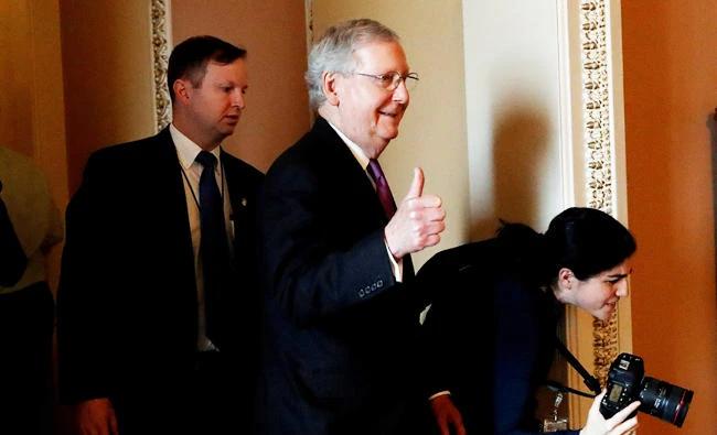 U.S. Senate Majority Leader Mitch McConnell (R-KY) gestures to reporters after lawmakers struck a deal to reopen the federal government three days into a shutdown on Capitol Hill in Washington, U.S., on Monday. (REUTERS)