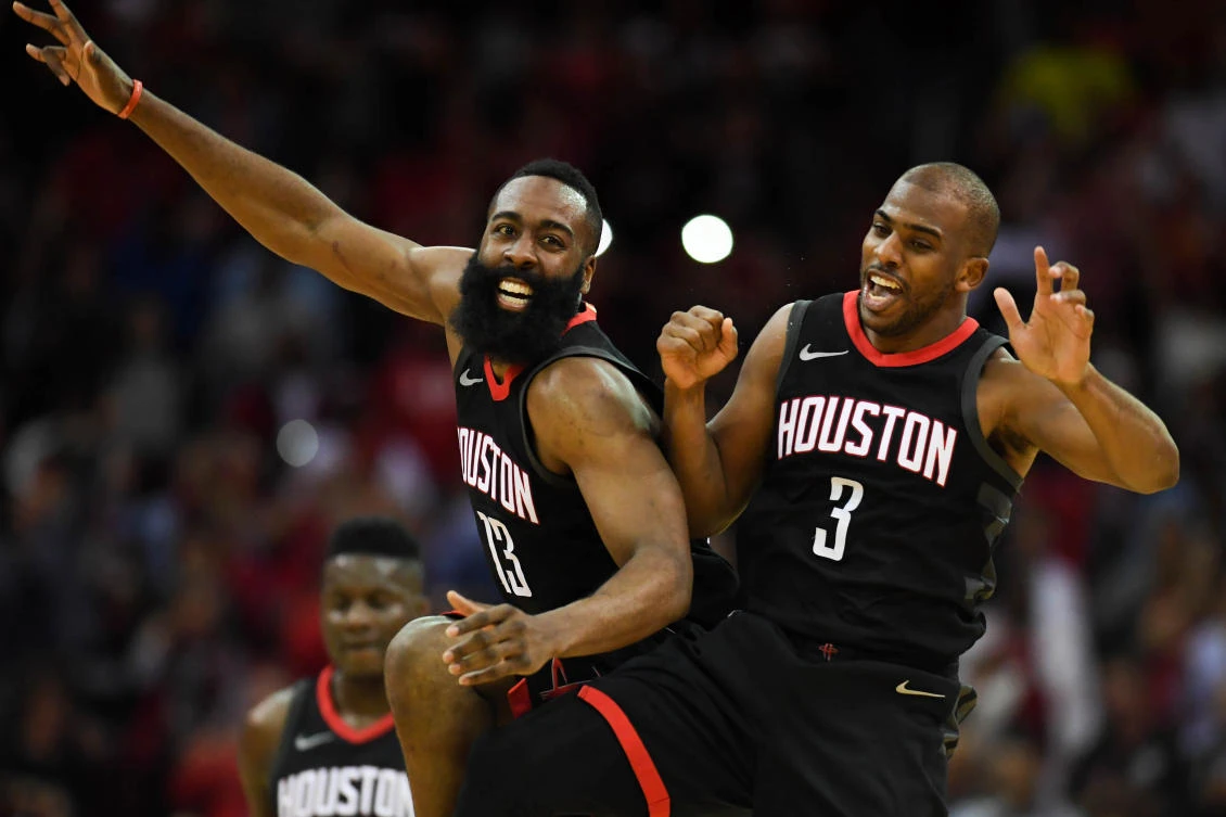 Houston Rockets’ James Harden, left, and Chris Paul celebrate after Paul made a three-pointer during the fourth quarter against the Miami Heat at Toyota Center. (USA TODAY Sports)