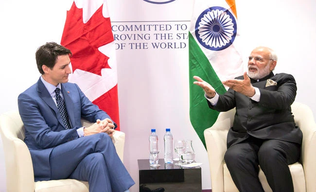 Indian Prime Minister Narendra Modi ranked protectionism among the three biggest challenges to global stability, along with climate change and terrorism. His Canadian counterpart Justin Trudeau also linked protectionism with the other challenges the WEF perceives: Technological disruption, gender inequalities and climate change. (AP)