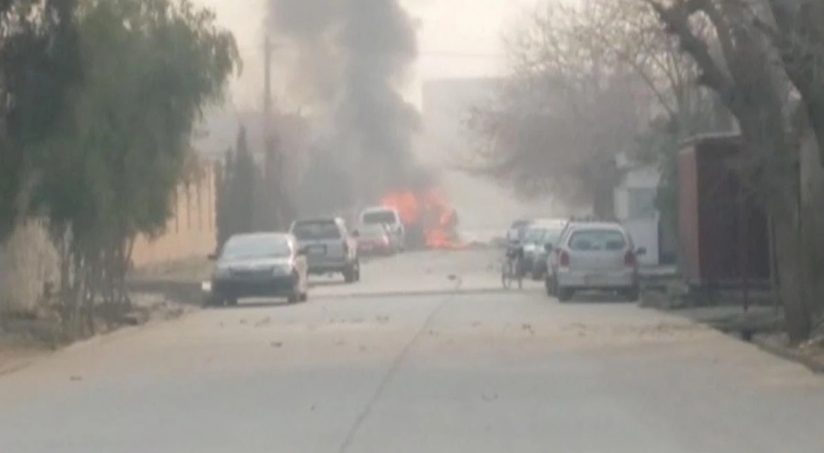 Smoke rises at the site of a blast near the office of the Save the Children aid agency in Jalalabad, Afghanistan, in this still image taken from Reuters TV footage, January 24, 2018. (Reuters)
