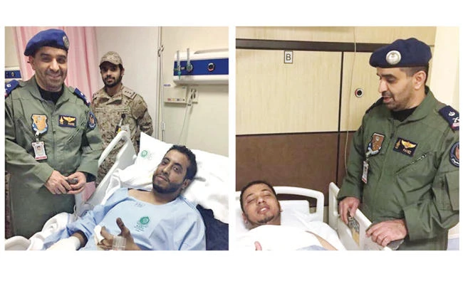 The rescued pilots Abdullah Al-Zir, right, and Fahd Al-Haqbani were taken to Najran hospital for treatment. (SPA)