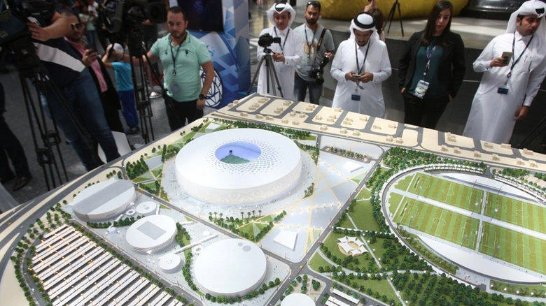 Above, Qatari officials unveil scaled models of the official football stadiums being built for 2022 FIFA World Cup. (Reuters)