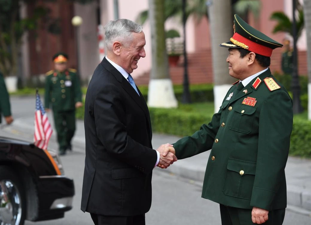 US Secretary of Defense James Mattis, left, is greeted by Vietnam's Defence Minister Ngo Xuan Lich as they meet for official talks in Hanoi on Thursday, January 25. The two discussed a plan for a US carrier visit to Danang in March. (AFP)