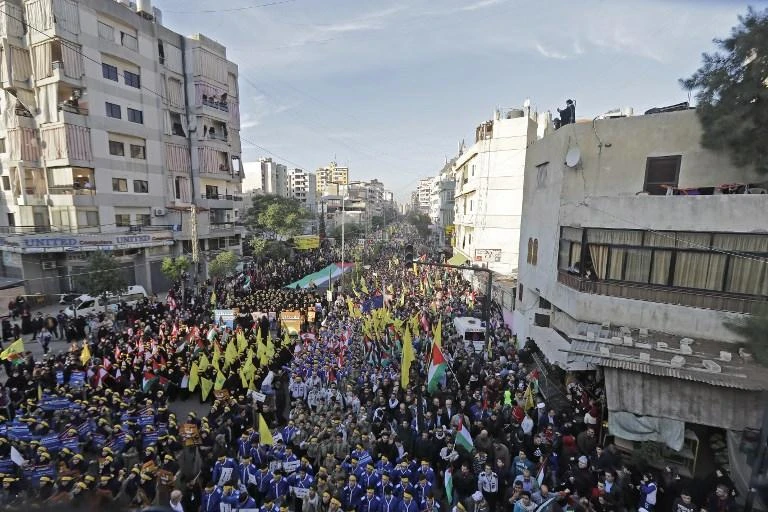 Supporters of Lebanon's Hezbollah Shiite movement march in Lebanon's capital Beirut in December. (AFP)