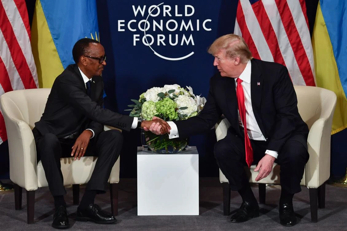 US President Donald Trump, rights, shakes hands with Rwandan President Paul Kagame, who was taking over as chair of the African bloc, during a bilateral talk on the sideline of the World Economic Forum annual meeting in Davos, Switzerland. (AFP)