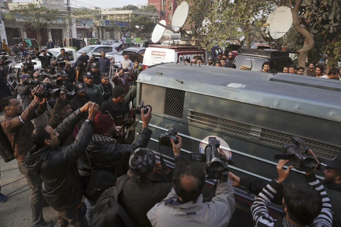 A prison van carrying Mohammad Imran, who is accused of the brutal killings of eight children in the eastern city of Kasur, arrives to a courthouse, in Lahore, Pakistan, Wednesday, Jan. 24, 2018. (AP)