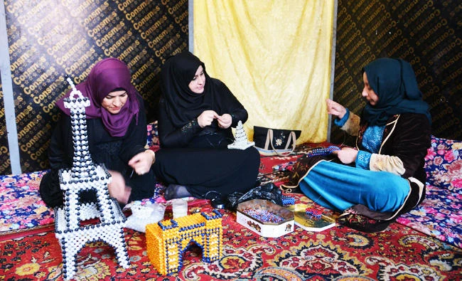 Displaced Iraqi women turn to handicrafts for survival