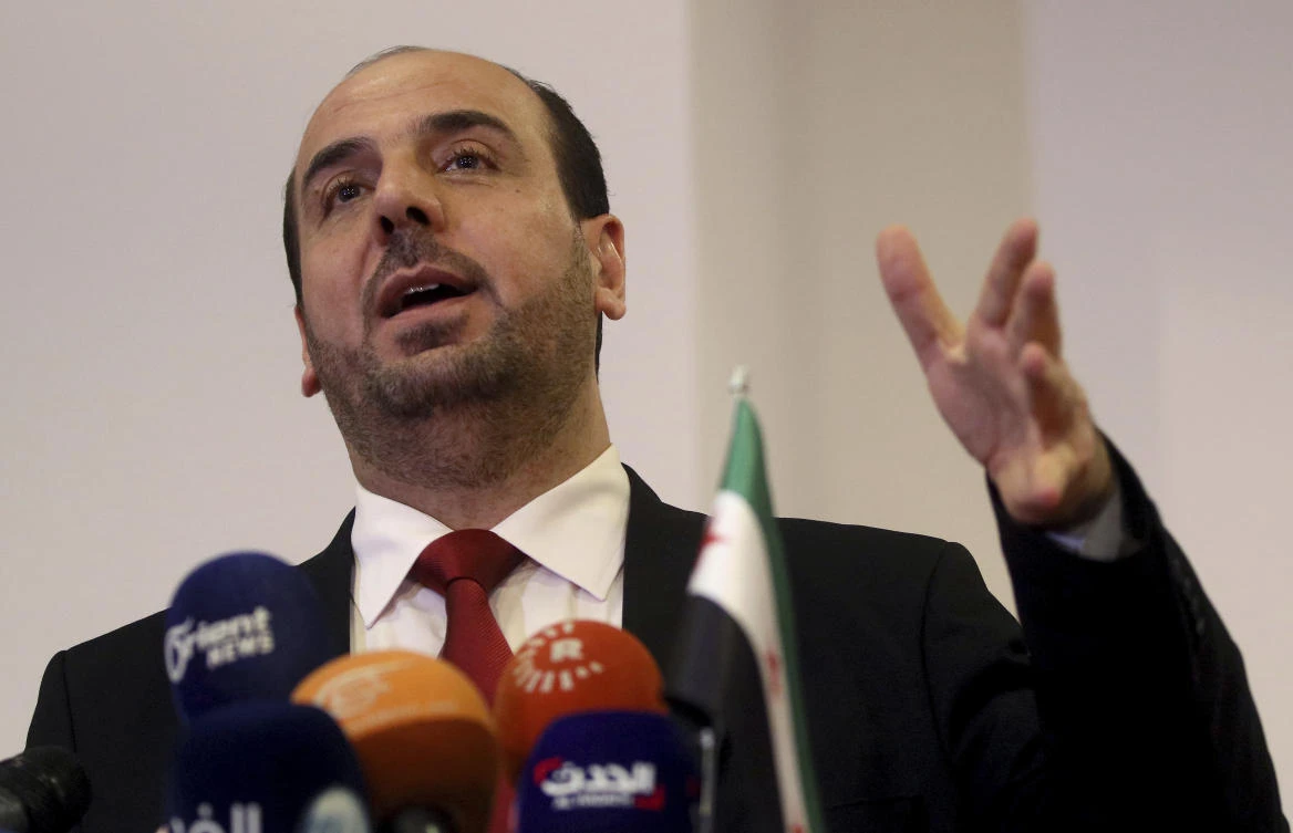 Nasr Al-Hariri, chief of the opposition delegation of Syria speaks during a press conference before Syria talks in Vienna, Austria, Wednesday, Jan. 24, 2018. (AP)