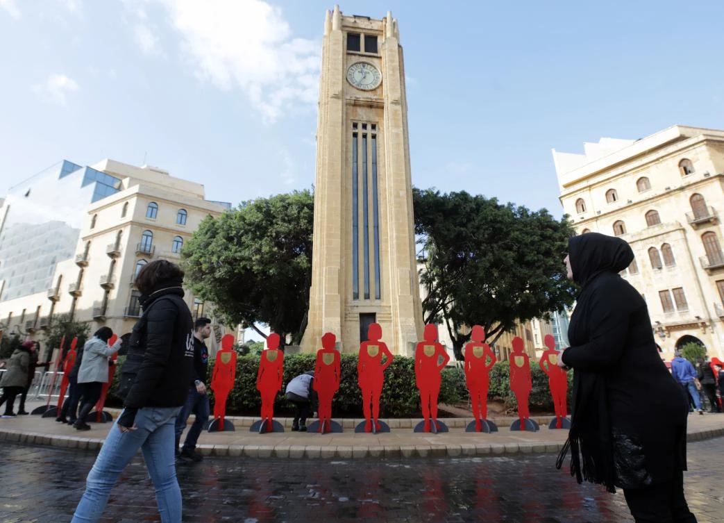 A picture taken on Jan. 27, 2018, shows figures representing women, killed by male relatives in Lebanon, including eight killed in the past 60 days, during a rally organized by activists from KAFA. KAFA, is an NGO that works for eradicating gender-based violence and exploitation of women and children. (AFP/Anwar Amro)