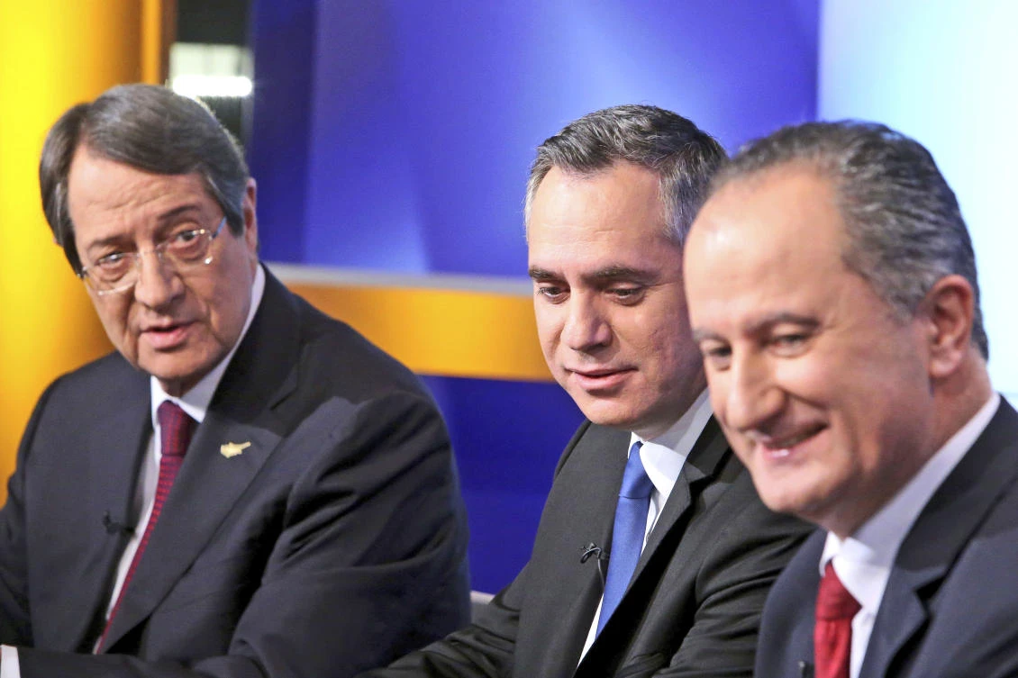 In this file photo dated Monday, Jan. 22, 2018, with the three front running presidential candidates, from left, Cyprus’ President Nicos Anastasiades, Nicolas Papadopoulos, and Stavros Malas, prior to their live televised debate in capital Nicosia, Cyprus. Cypriots will vote upcoming Sunday in presidential elections with critical topics including the reunification of the divided island and economic recovery, likely to be decisive in the vote. (AP/Petros Karadjias, FILE)