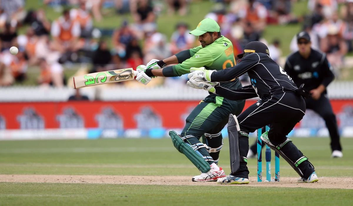 In this file photo, Pakistan’s Haris Sohail bats as New Zealand’s Tom Latham, left, looks on during the fourth one-day international cricket match between New Zealand and Pakistan at Seddon Park in Hamilton on Jan. 16, 2018. (AFP)