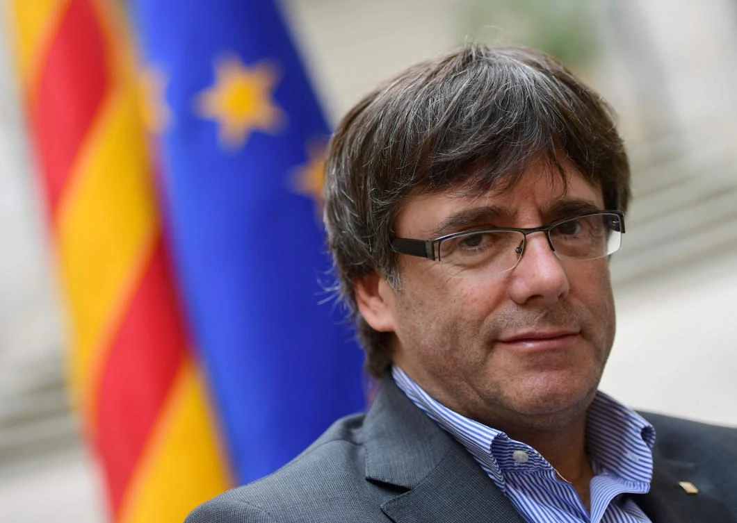 Fugitive Catalan chief seeks parliament protection for vote