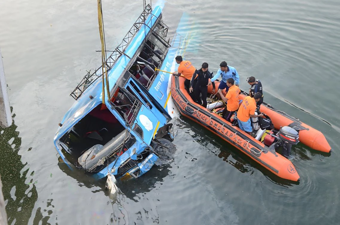 At least 36 dead as bus plunges off bridge in eastern India