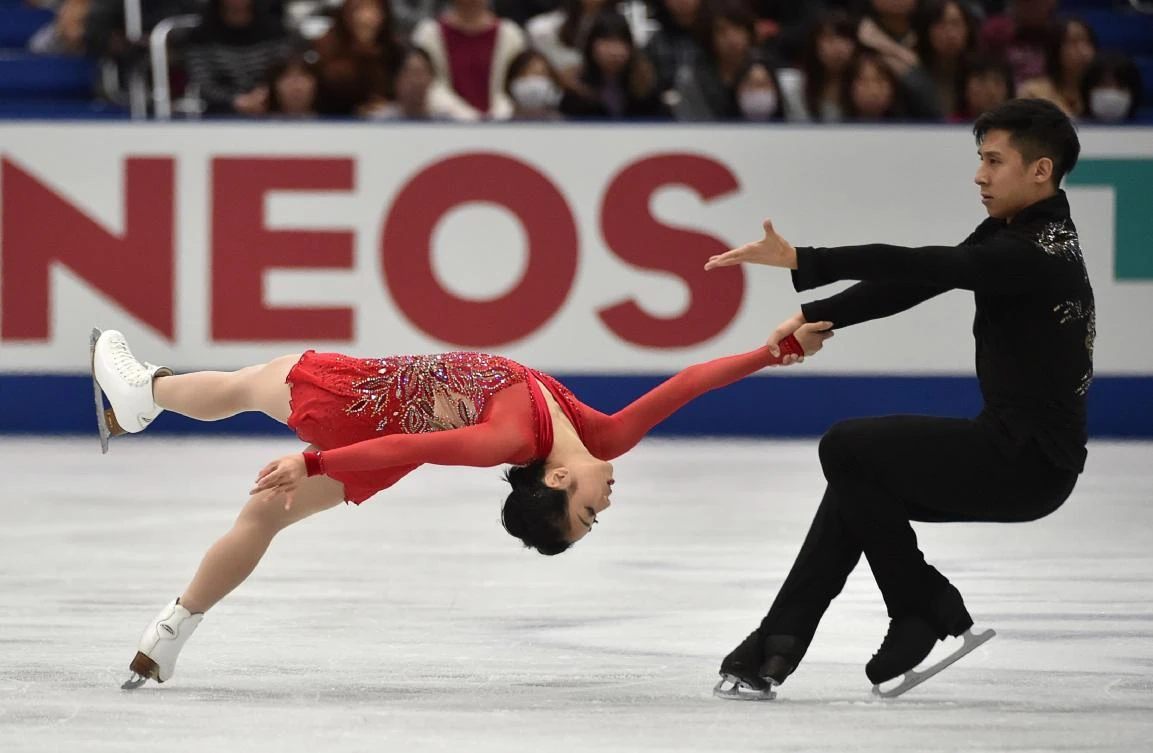 Sui Wenjing, left, and Han Cong of China performing during the pairs free skating figure skating event at the NHK Trophy in Osaka, which they eventually won. (AFP)