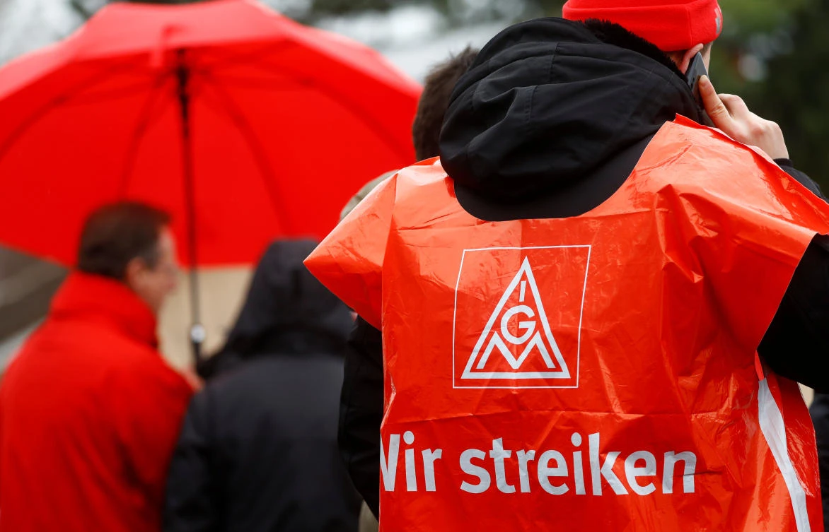 Members of German industrial trade union IG Metall take part in a 24-hour strike at VAC (VACUUMSCHMELZE) plant in Hanau. Around 260 companies are expected to be hit by walkouts in support of IG Metall’s demands from Wednesday to Friday. (Reuters)