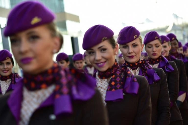 Grid girls pose before the start of the of the Abu Dhabi Formula 1 Grand Prix at the Yas Marina circuit, UAE. (AFP)