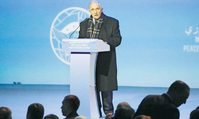 Mohammed Ghassan Al-Qalaa, head of the Syrian regime-controlled chamber of commerce, at the Sochi congress. (Reuters)