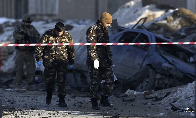 Afghan security personnel investigate at the site of a suicide bomb attack in Kabul. (REUTERS)