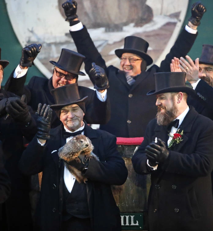 Punxsutawney Phil’s handlers said that the groundhog has forecast six more weeks of winter weather. (AP Photo)