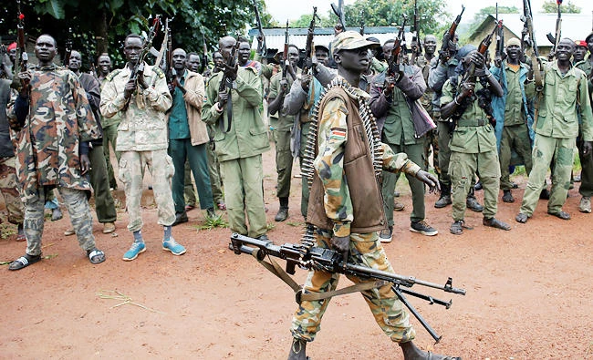 SPLA-IO (SPLA-In Opposition) rebels parade in Yondu, the day before an assault on government SPLA (Sudan People's Liberation Army) soldiers in the town of Kaya, on the border with Uganda, South Sudan, in this August 25, 2017 file photo. (REUTERS)