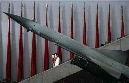Visitors walk past a Chinese-made Hongqi-2 missile at the Military Museum in Beijing February 23, 2007. (Reuters)