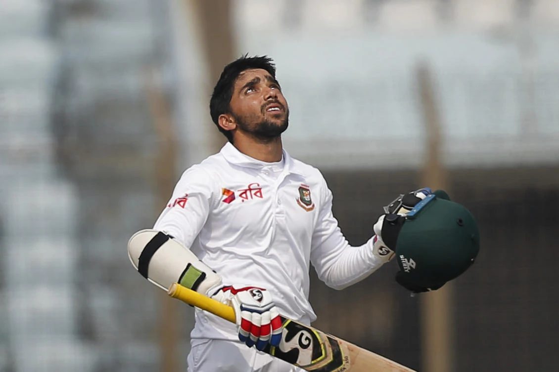 Bangladesh's Mominul Haque looks skywards to celebrate scoring a hundred during the fifth and final day of the first Test against Sri Lanka in Chittagong (AP Photo)